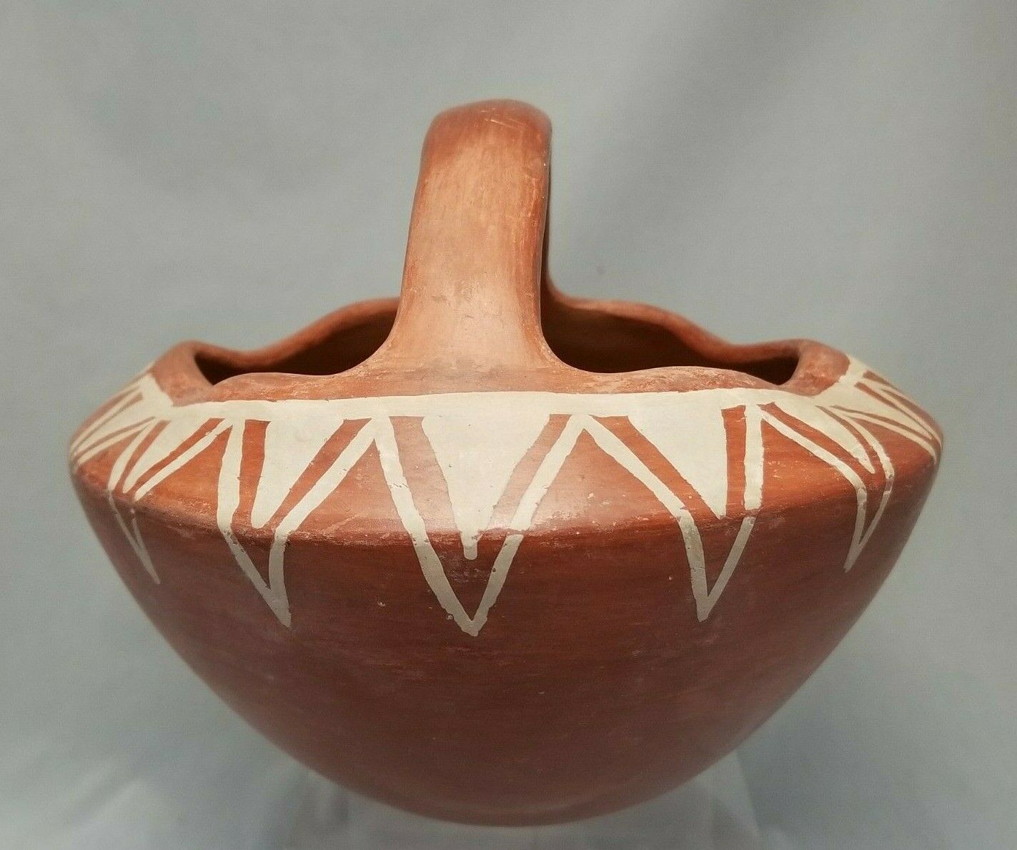 Vintage Pueblo pottery handled basket 7 1/2